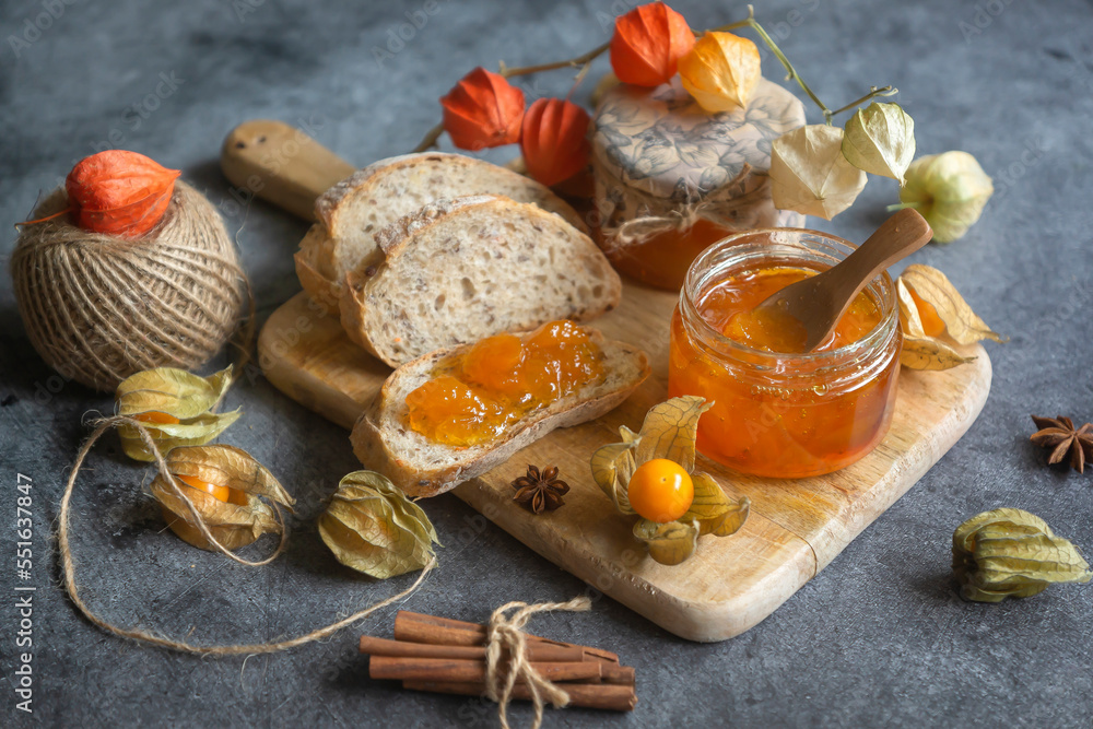 Tasty, fragrant jam and physalis fruits on the table.