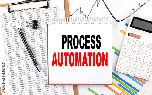 PROCESS AUTOMATION text on notebook with chart, calculator and pen