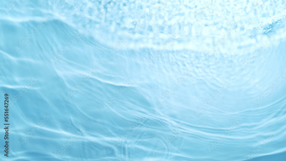 Texture of blue water surface in pool.