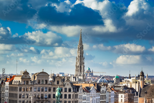 View of downtown Brussels, Belgium from Mont des Arts looking toward the spire of the Brussels Town Hall building in the Grand Place