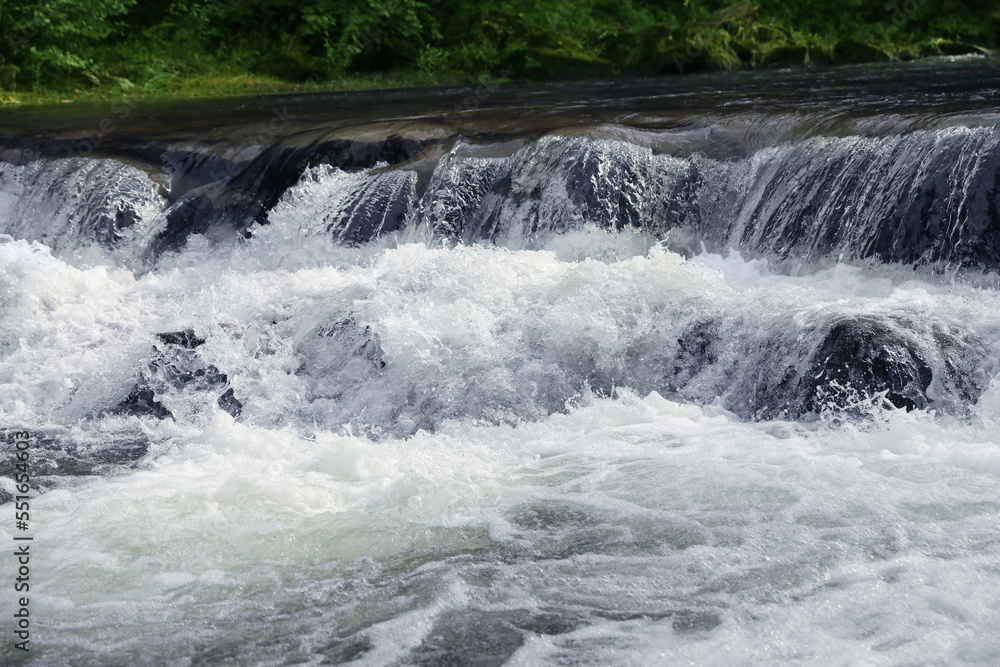 Picturesque view on beautiful river with rapids Picturesque view on beautiful river with rapids