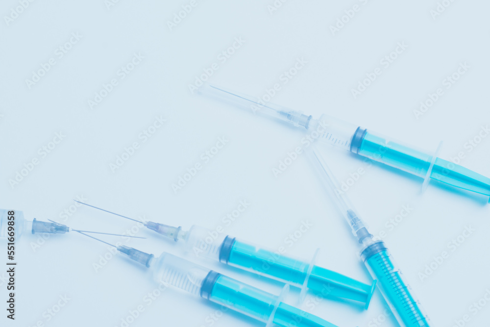 Medical syringe on a white background. A syringe for injection. The concept of health and beauty Medical syringe on a white background. A syringe for injection. The concept of health and beauty
