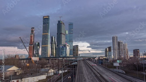 Wallpaper Mural Moscow City business center skyscrapers office buildings and luxury apartments day to night transition timelapse hyperlapse. Road traffic and towers panorama after sunset Torontodigital.ca