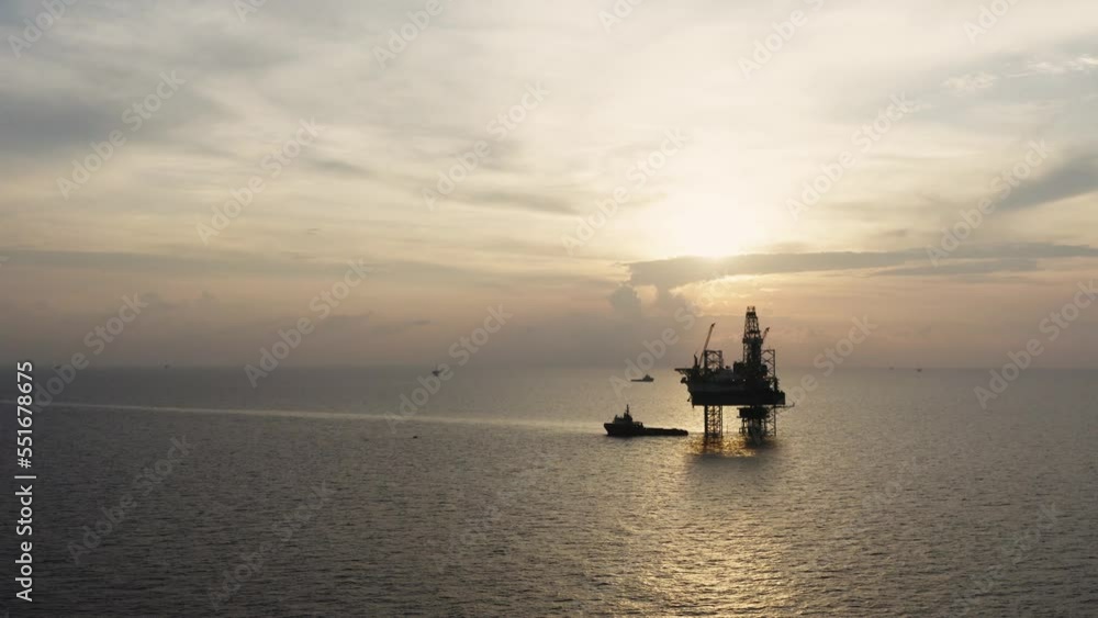 Jack up drilling rig and production platform in the middle of the ocean at sunrise time
Jack up drilling rig and production platform in the middle of the ocean at sunrise time