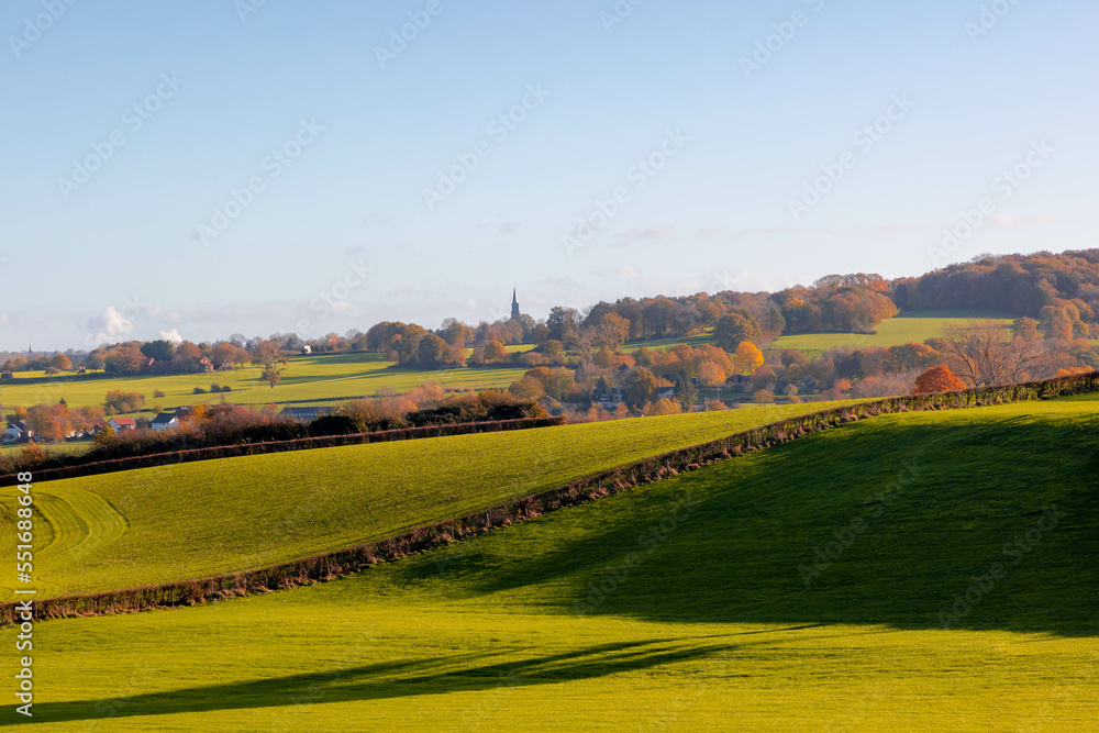Autumn landscape of hilly countryside in Zuid-Limburg, Small houses on hillside with sunlight in the morning, Gulpen-Wittem is a villages in southern part of the Dutch province of Limburg, Netherlands Autumn landscape of hilly countryside in Zuid-Limburg, Small houses on hillside with sunlight in the morning, Gulpen-Wittem is a villages in southern part of the Dutch province of Limburg, Netherlands