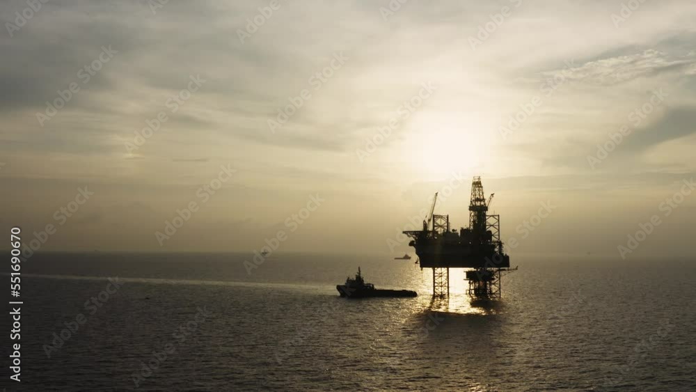 Jack up drilling rig and production platform in the middle of the ocean at sunrise time
Jack up drilling rig and production platform in the middle of the ocean at sunrise time