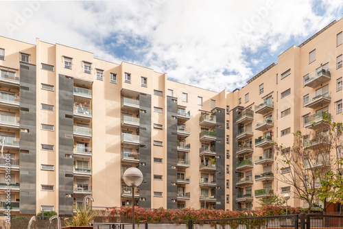Facades of nondescript style modern urban residential apartment buildings