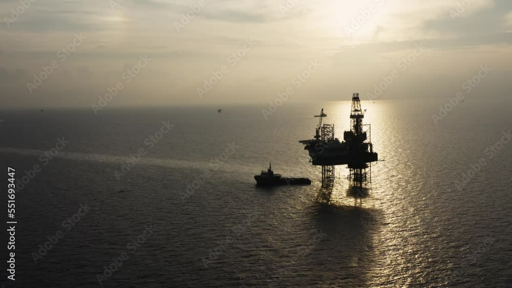 Jack up drilling rig and production platform in the middle of the ocean at sunrise time
Jack up drilling rig and production platform in the middle of the ocean at sunrise time