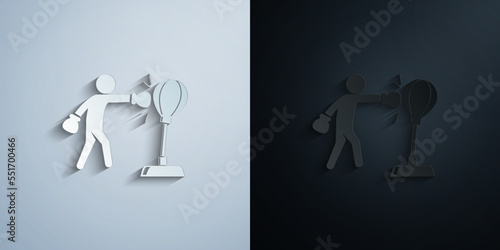 Boxer beats punching bag paper icon with shadow vector illustration