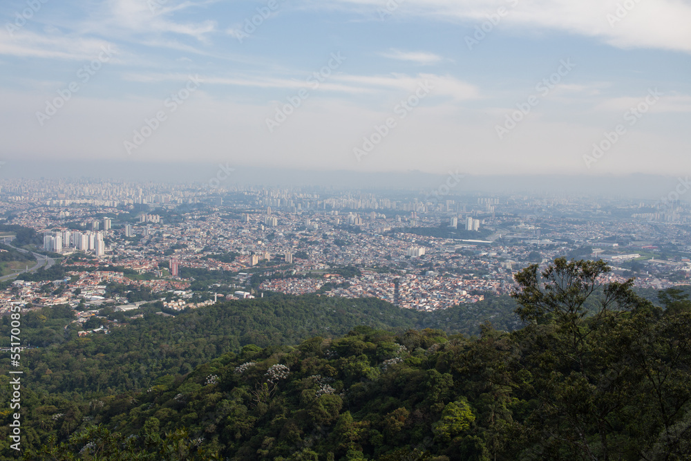 Vista Oeste do Pico do Jaraguá - SAO PAULO, SP, BRAZIL - NOVEMBER 13, 2022: View of the west side of the city from Peak of Jaragua, with the Bandeirantes highway on the left.