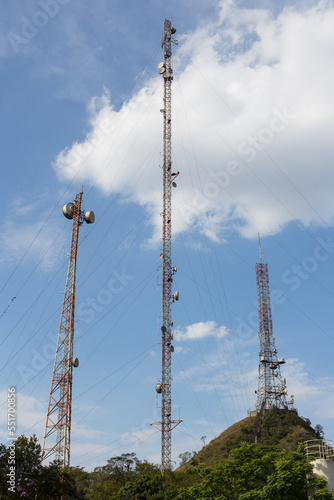 Torres do Pico do Papagaio - SAO PAULO, SP, BRAZIL - NOVEMBER 13, 2022: Telecommunications towers at Pico do Papagaio in Jaragua State Park, with a cable-stayed tower in the center. photo