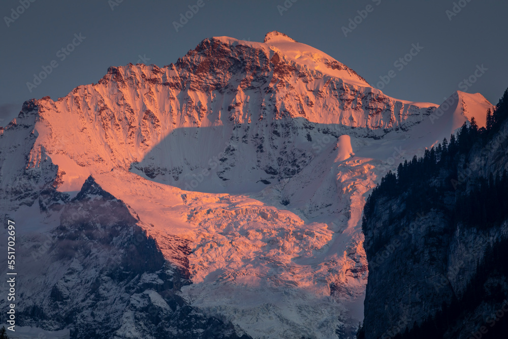 Fototapeta premium Dramatic Jungfrau mountain, Bernese Alps at sunset, Interlaken, Switzerland