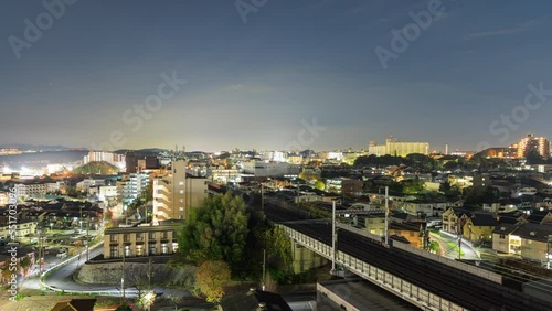 Wallpaper Mural Bullet trains and cars zip through residential neighborhood at night Torontodigital.ca