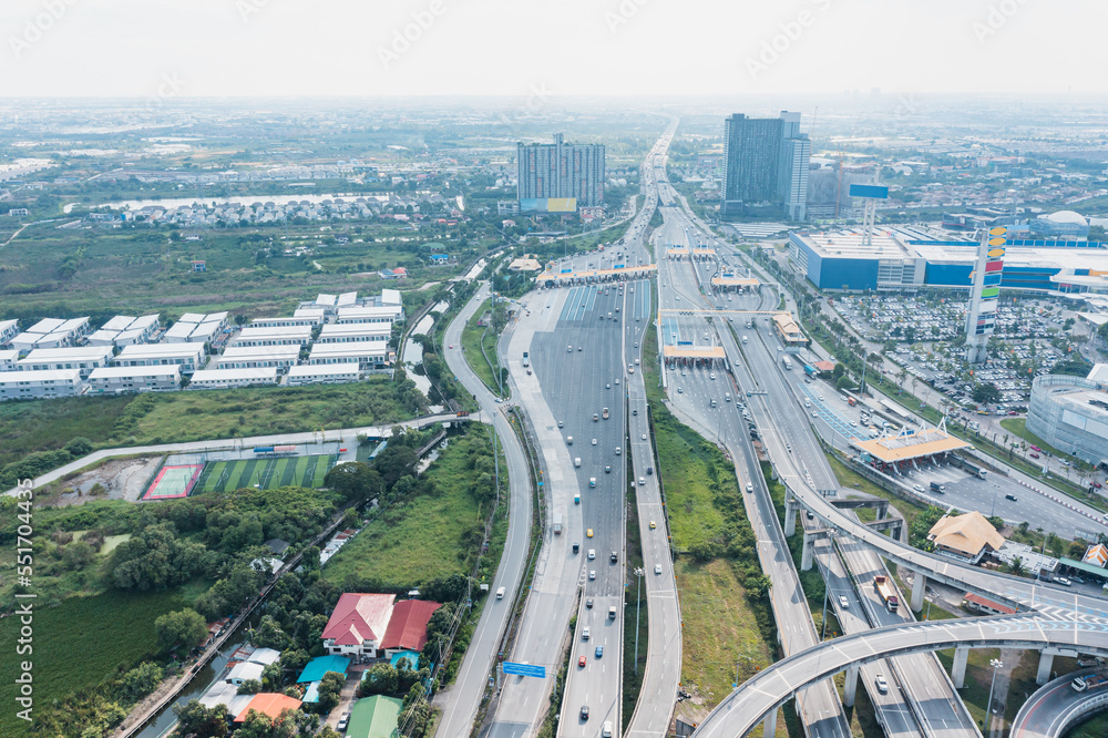 Multilevel junction motorway top view, Road traffic an important infrastructure in Thailand.Expressway Road and Roundabout. Transportation and travel concept.