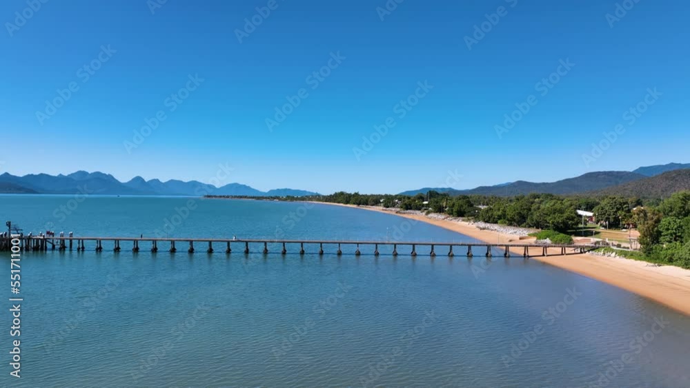Flight south over Cardwell Jetty and beach towards Hinchinbrook Island Flight south over Cardwell Jetty and beach towards Hinchinbrook Island