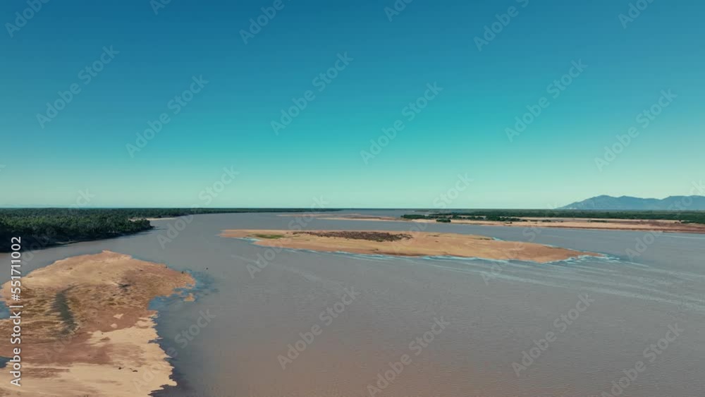 Flying over the islands amidst Queensland's Burdekin River towards Coral Sea Flying over the islands amidst Queensland's Burdekin River towards Coral Sea
