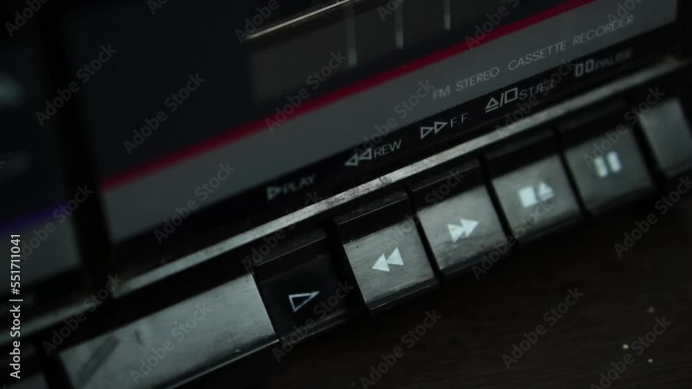 Close Up of Placing Audio Cassette Tape, Pressing Play on Vintage Boombox Player 60fps Close Up of Placing Audio Cassette Tape, Pressing Play on Vintage Boombox Player 60fps