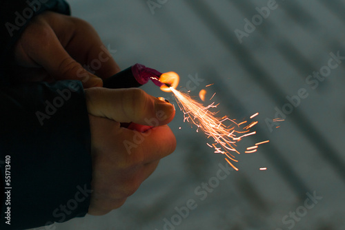 Fototapeta Burning Firecracker with Sparks