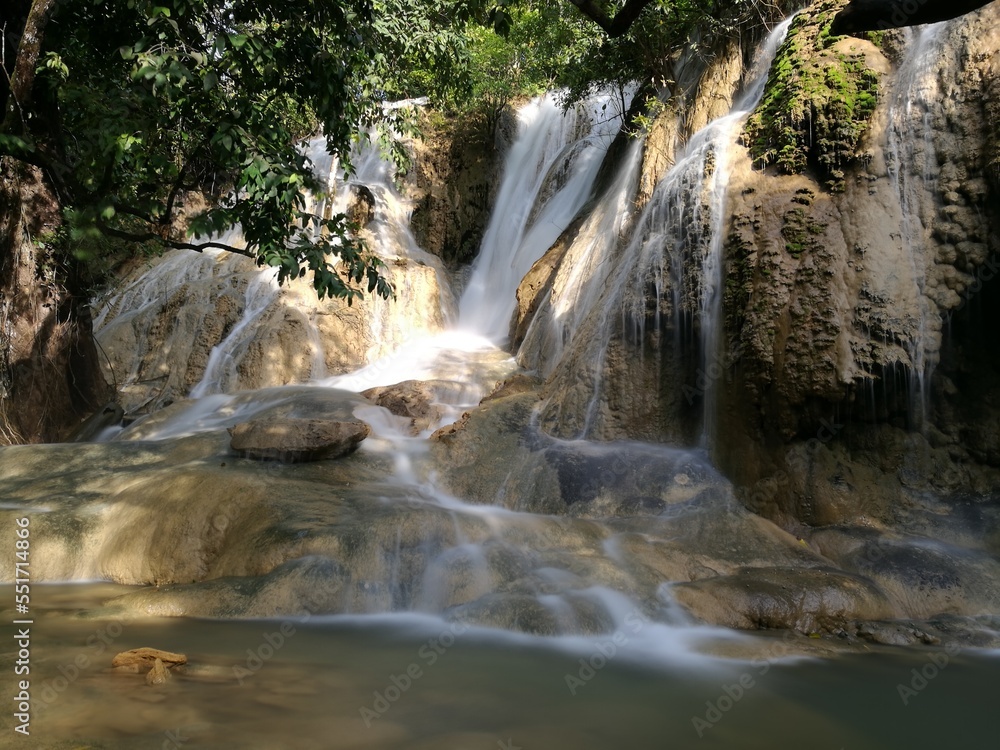 Fototapeta premium Long exposure of waterfall flowing like silky water