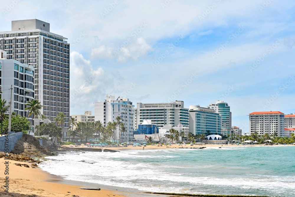 Beachfront resorts lining the Condado coastline in the metro area of San Juan on the island of Puerto Rico in the Caribbean.
