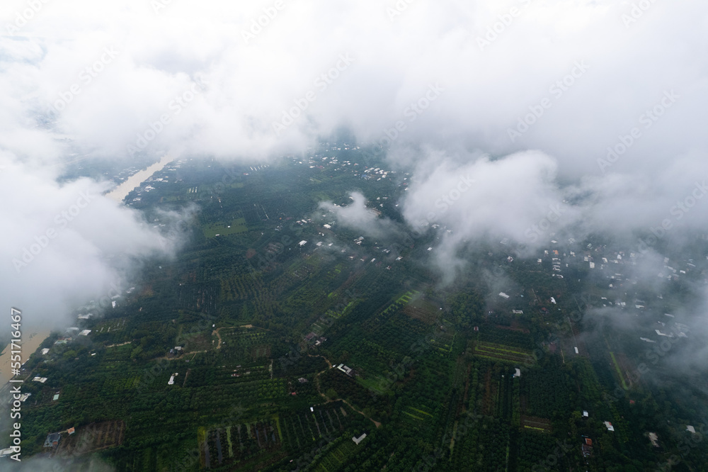 aerial view of white clouds and below is the Mekong river delta, South Vietnam. 