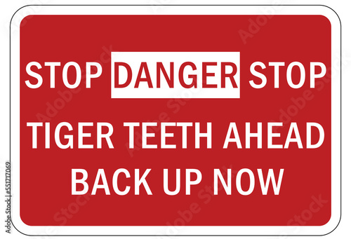 Tire damage sign and warning sign for one way road spikes tiger teeth ahead back up now