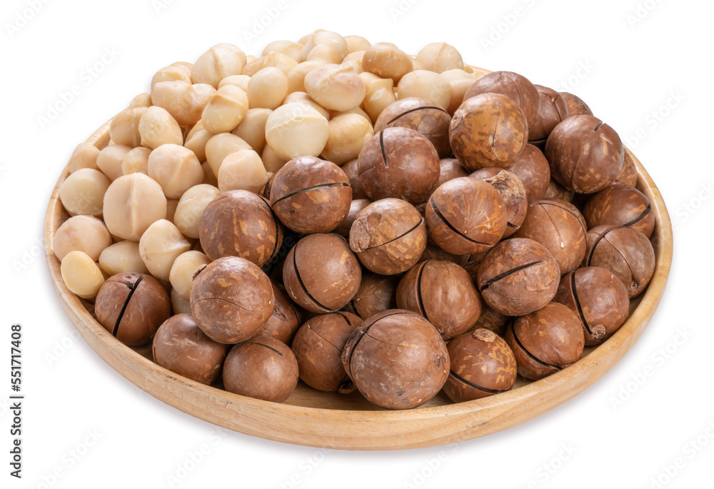 Macadamia nuts and Macadamia with hard shell on wooden background isolate on white with clipping path. Macadamia nuts and Macadamia with hard shell on wooden background isolate on white with clipping path.
