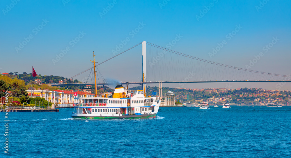 Sea voyage with old ferry (steamboat) in the Bosporus with Bosporus bridge, istanbul 