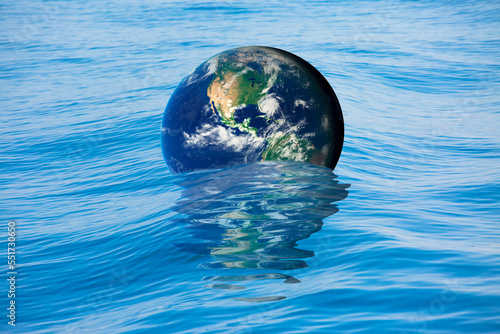 Planet earth in wave of water in the sea "Elements of this Image Furnished by NASA"