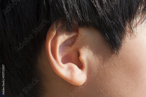 Ear of child or ear of boy. photo