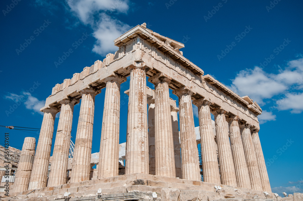 Ancient  temple of parthenon with symmetrical columns   at acropolis hill in  Athens, Greece
