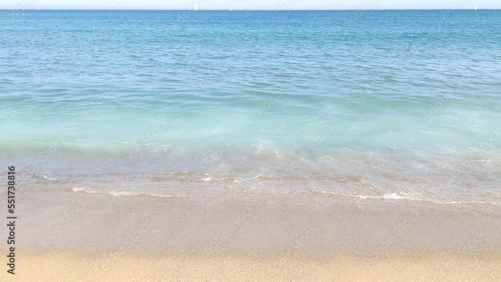 Blue sea and sandy beach. Mediterranean coast Blue sea and sandy beach. Mediterranean coast