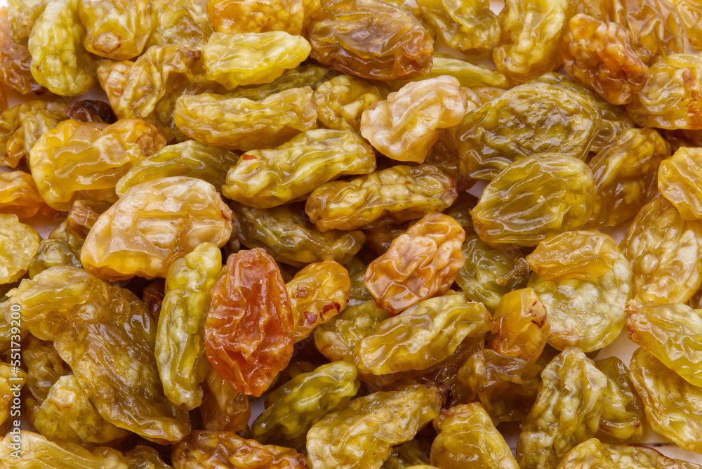 Texture of dried raisins. Dry raisins as background. Diet food concept