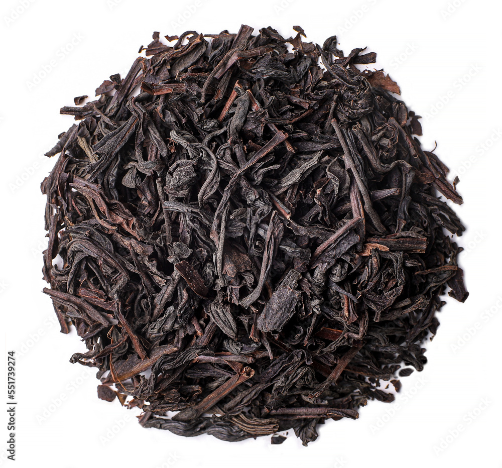 Dry black tea, leaves, white background Dry black tea, leaves, white background