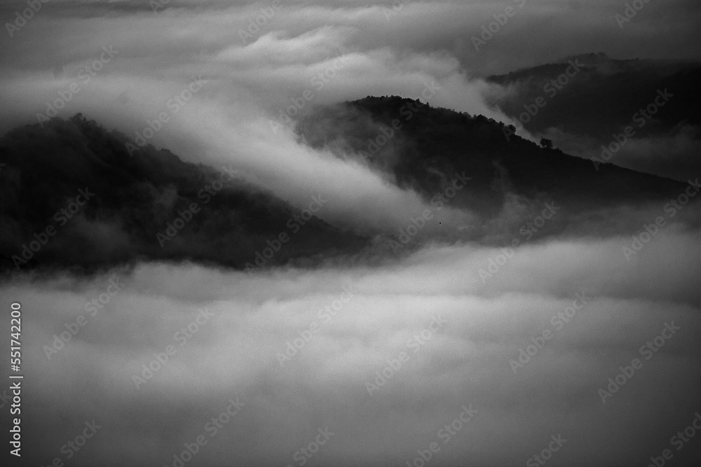 Fototapeta premium clouds over the fog