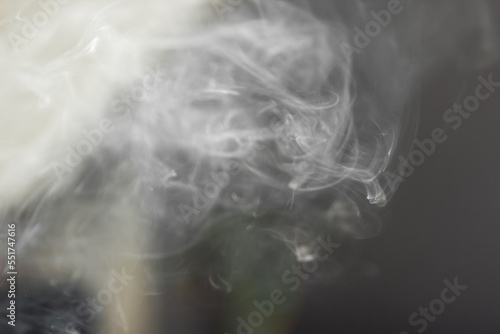 Clouds of smoke from the ceiling at living room in home. Danger and risk of fire in household appliances.