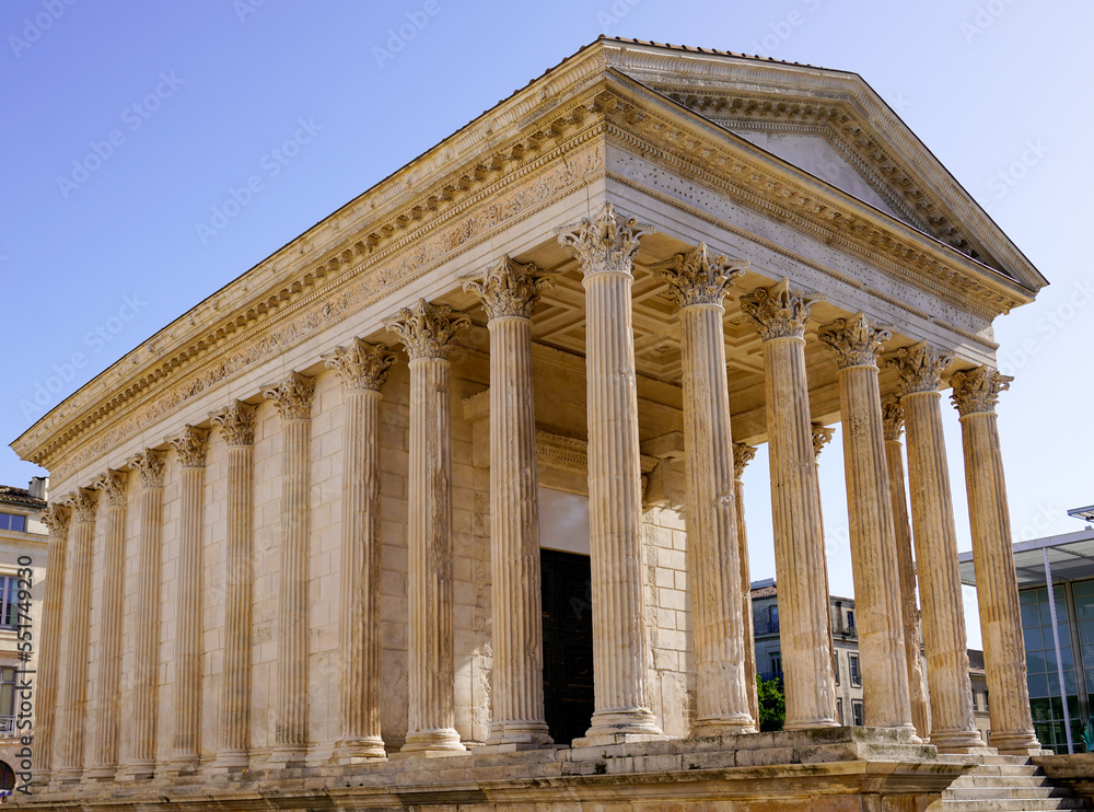 Square House building antique Maison Carree in Nimes in south France