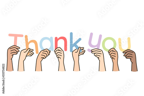 Hands of people with different skin colors hold letters forming phrase Thank you. Multicultural arms, palms making lettering about gratitude, appreciation. Vector minimalistic modern isolated design. photo