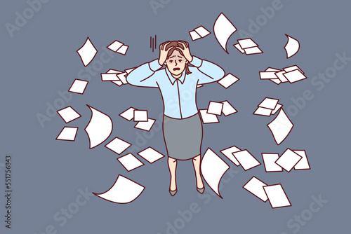 Discouraged woman clutching head while standing among scattered business documents. Girl in office clothes suffers due to work overload or lack of professional competencies. Flat vector image 