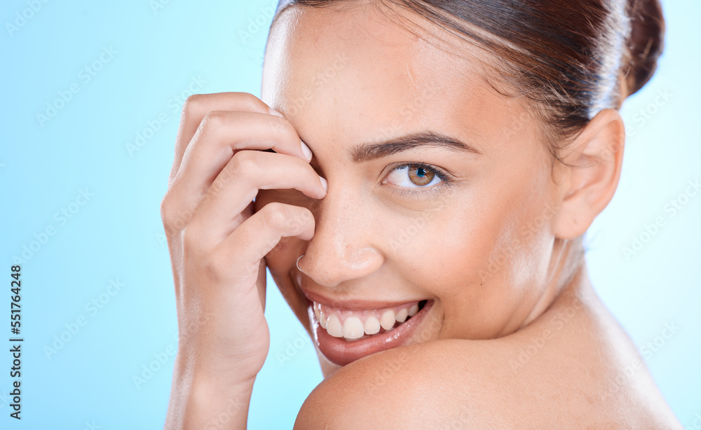 Skincare, beauty and portrait of woman on blue background with happy smile from Australia. Makeup, cosmetic glamour and luxury skin care with beautiful face, natural cosmetics for detox facial at spa Skincare, beauty and portrait of woman on blue background with happy smile from Australia. Makeup, cosmetic glamour and luxury skin care with beautiful face, natural cosmetics for detox facial at spa