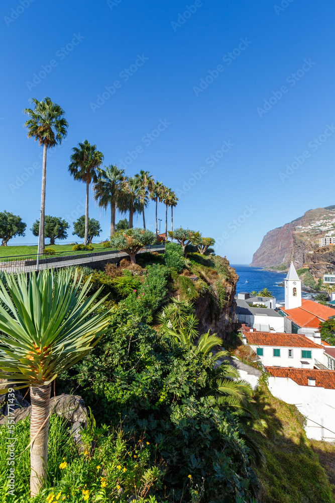 View on the town of Camara de Lobos with church portrait format on Madeira island in Portugal