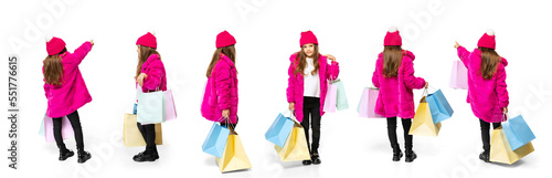 Collage. Stylish little girl, child in bright winter jacket standing with many shopping bags isolated over white background photo