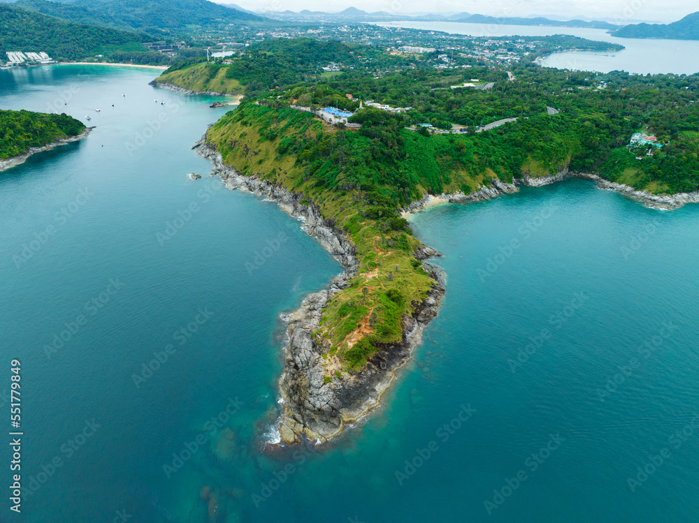 Amazing landscape nature scenery view of Beautiful tropical sea with Sea coast view in summer season image by Aerial view drone top down, high angle view Located at Laem Promthep Phuket Thailand