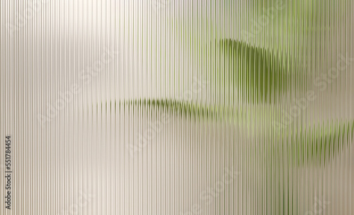 Clear and glossy reeded glass partition wall in dappled light with beautiful green tropical banana tree in bathroom or luxury interior design, architecture and product display background