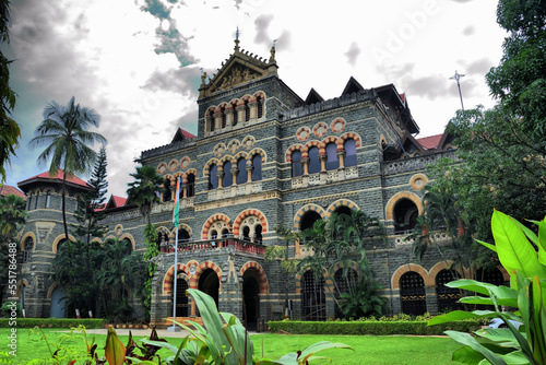View of the main monuments and tourist spots of Mumbai (India). Colaba neighborhood. English colonial style buildings (19th century)