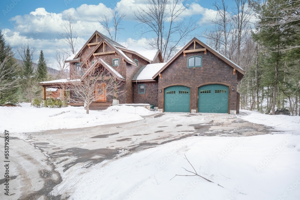 Obraz premium Custom-built house in the mountains. Exterior facade.