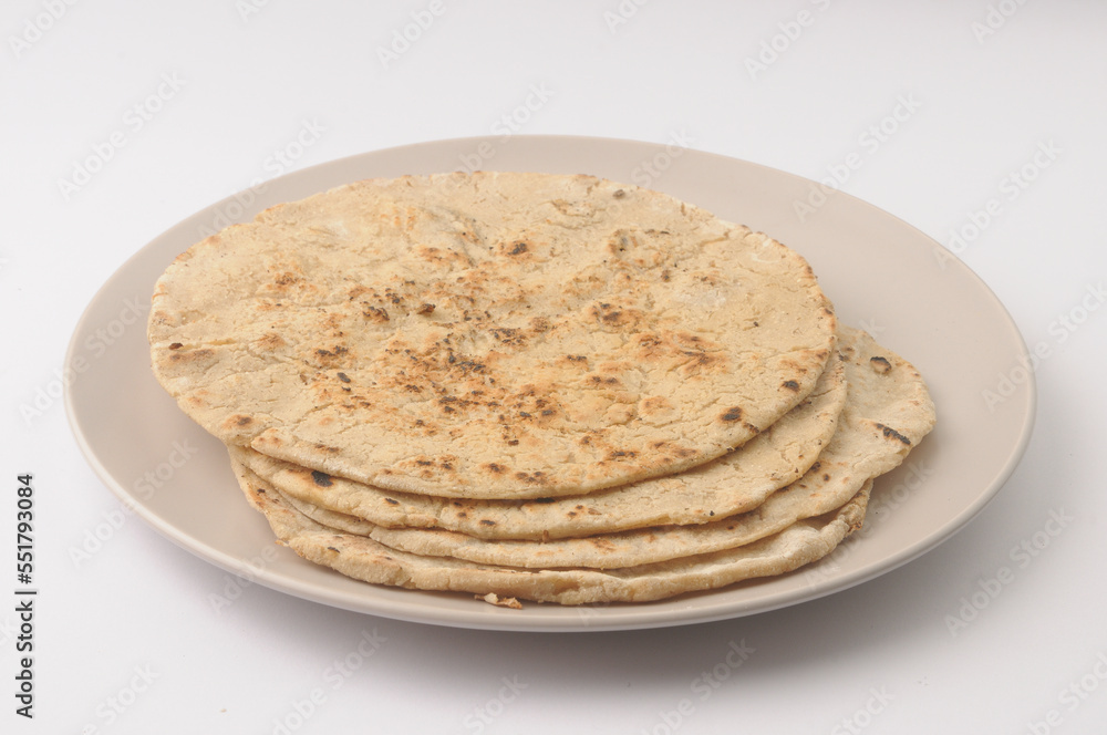 Jowar rotis or jowar bhakri, made from jowar a grain harvested in India, Maharashtra Jowar rotis or jowar bhakri, made from jowar a grain harvested in India, Maharashtra