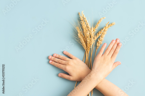 suffers from a gluten. Gluten intolerant . children  refuses to eat wheat . Celiac day  photo