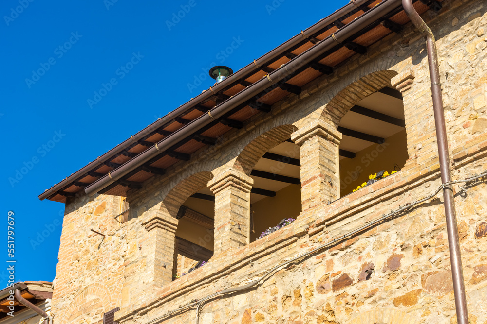San Quirico d'Orcia, Italy, 16 April 2022: Medieval church of the historic center San Quirico d'Orcia, Italy, 16 April 2022: Medieval church of the historic center