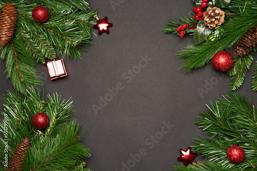 Christmas tree decorations on a black background
